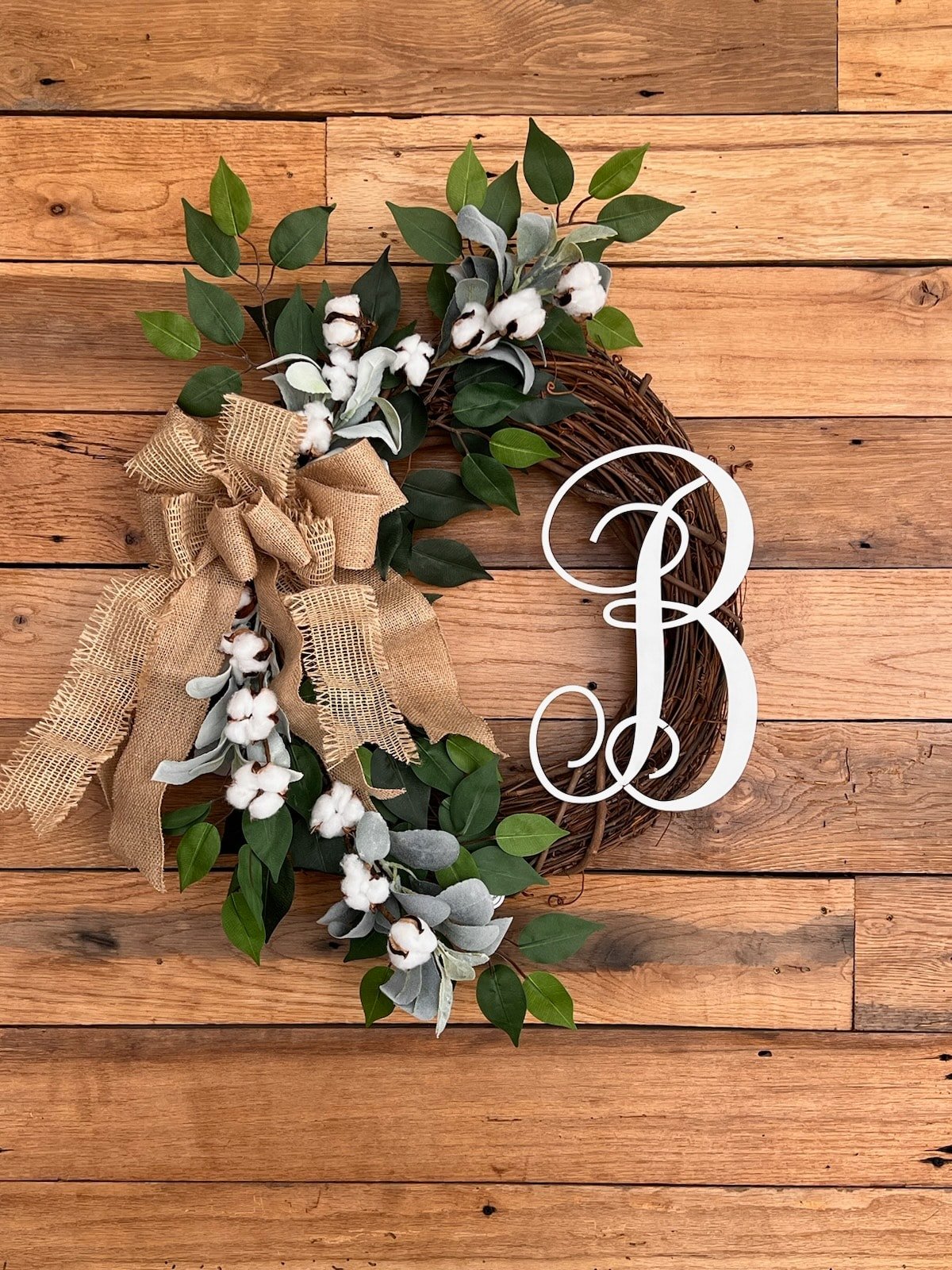 Neutral Wreath with cotton accents. Comes with or without an attachment of your choice.